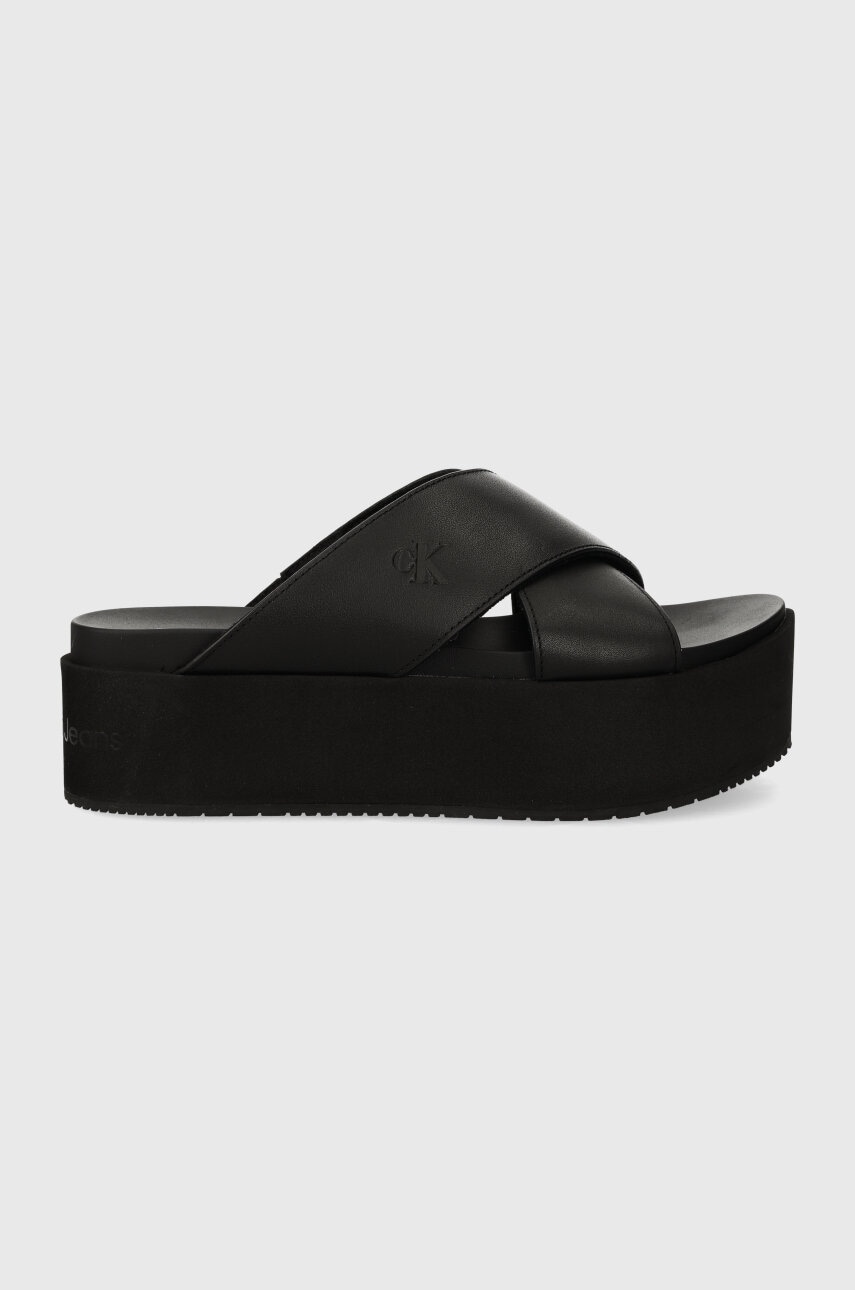 Δερμάτινες παντόφλες Calvin Klein Jeans FLATFORM CROSS MG UC FLATFORM CROSS MG UC γυναικείες, χρώμα: μαύρο YW0YW01349